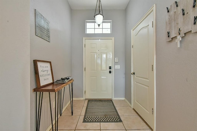 4616 Midway Dr, Norman, OK 73072 - foyer entrance featuring light tile patterned flooring and baseboards