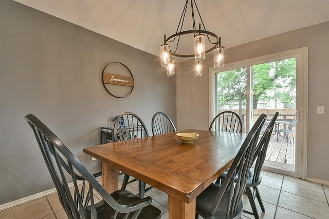 4616 Midway Dr, Norman, OK 73072 - dining space with a chandelier, light tile patterned flooring, and vaulted ceiling