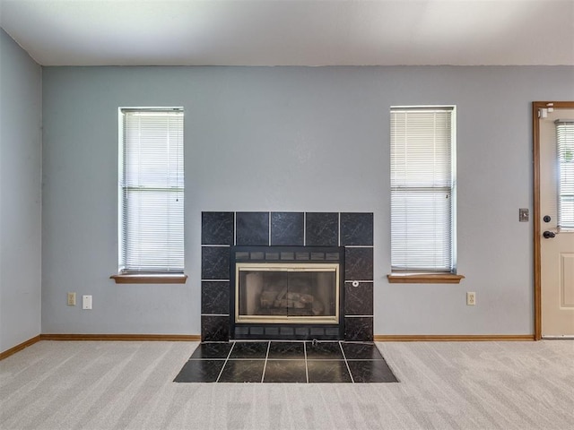 321 Bradgate Dr, Yukon, OK 73099 - detailed view of carpet flooring and a tiled fireplace