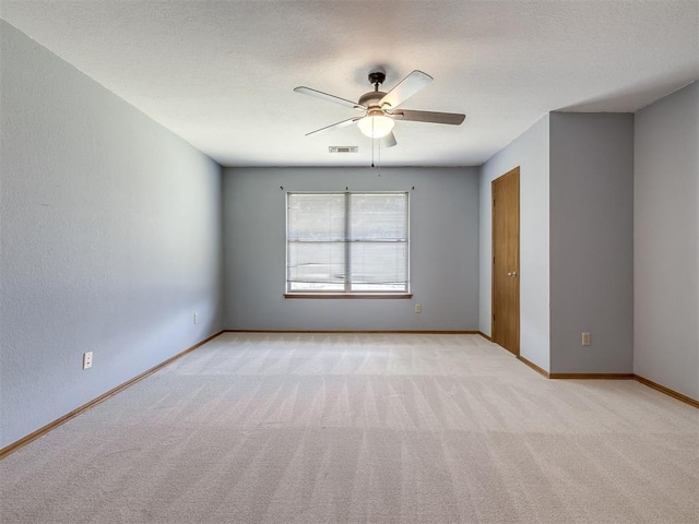 321 Bradgate Dr, Yukon, OK 73099 - unfurnished room with ceiling fan and light carpet