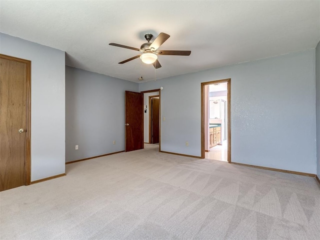 321 Bradgate Dr, Yukon, OK 73099 - unfurnished bedroom featuring light colored carpet and ceiling fan