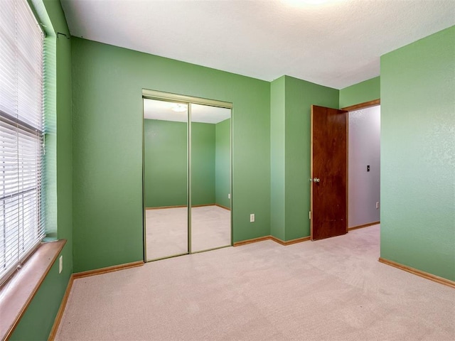 321 Bradgate Dr, Yukon, OK 73099 - unfurnished bedroom with carpet and a closet