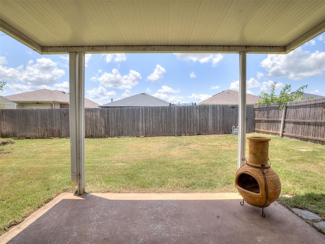 321 Bradgate Dr, Yukon, OK 73099 - fenced backyard with a patio area