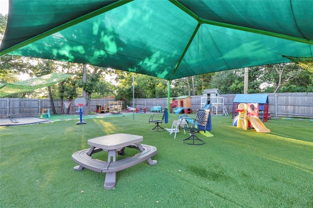 4213 NE 143rd St, Edmond, OK 73013 - fenced backyard featuring a playground