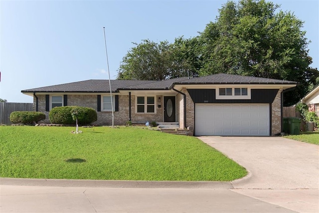 300 Yukon Ave, Yukon, OK 73099 - ranch-style home with driveway, a garage, and brick siding