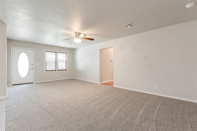 300 Yukon Ave, Yukon, OK 73099 - empty room featuring a ceiling fan, light carpet, and a smoke detector