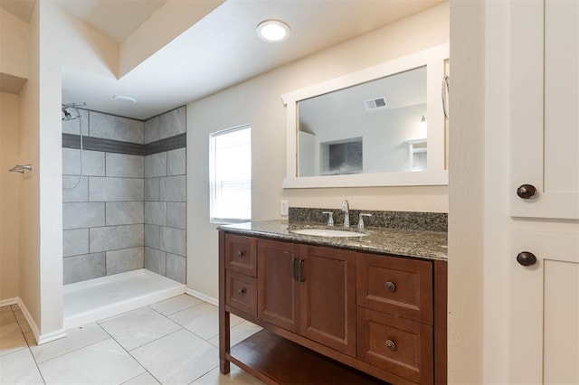 300 Yukon Ave, Yukon, OK 73099 - full bath featuring vanity and tiled shower
