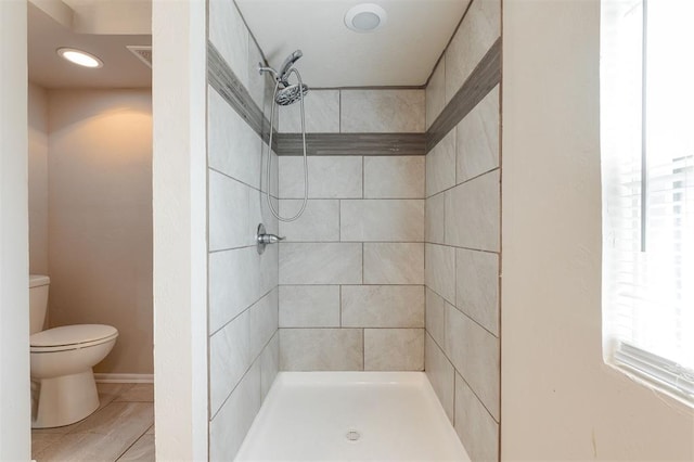 300 Yukon Ave, Yukon, OK 73099 - full bathroom featuring toilet and a tile shower