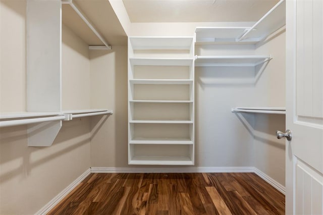 300 Yukon Ave, Yukon, OK 73099 - spacious closet featuring wood finished floors