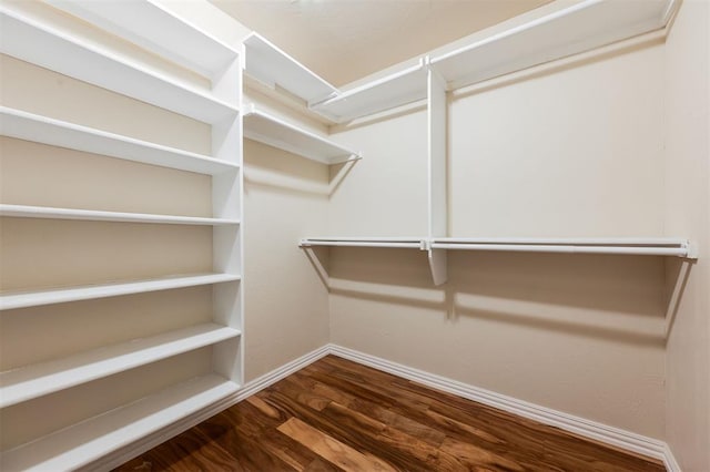 300 Yukon Ave, Yukon, OK 73099 - spacious closet featuring wood finished floors
