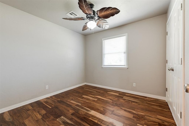 300 Yukon Ave, Yukon, OK 73099 - unfurnished room featuring dark wood finished floors and ceiling fan