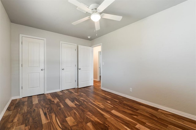 300 Yukon Ave, Yukon, OK 73099 - unfurnished bedroom with wood finished floors and ceiling fan