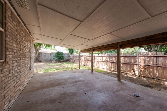 300 Yukon Ave, Yukon, OK 73099 - fenced backyard featuring a patio