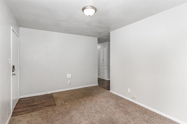 3701 Woodside Dr, Oklahoma City, OK 73110 - carpeted empty room featuring a textured ceiling and baseboards