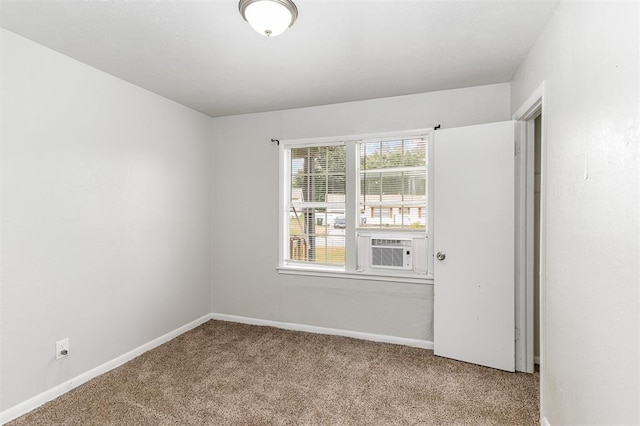 3701 Woodside Dr, Oklahoma City, OK 73110 - carpeted empty room with baseboards and cooling unit