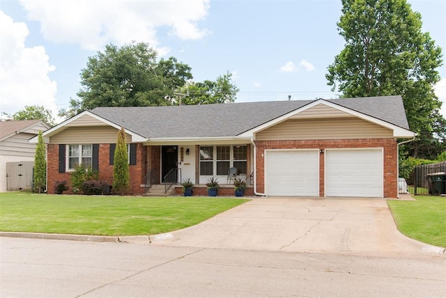 2800 Kerry Ln, Oklahoma City, OK 73120 - ranch-style home featuring a garage, brick siding, a front lawn, concrete driveway, and covered porch