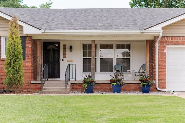 2800 Kerry Ln, Oklahoma City, OK 73120 - property entrance featuring covered porch, brick siding, a shingled roof, and a yard