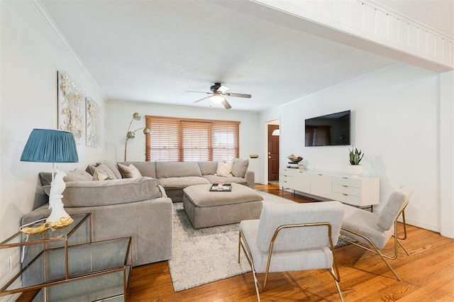 2800 Kerry Ln, Oklahoma City, OK 73120 - living area featuring crown molding, a ceiling fan, and wood finished floors