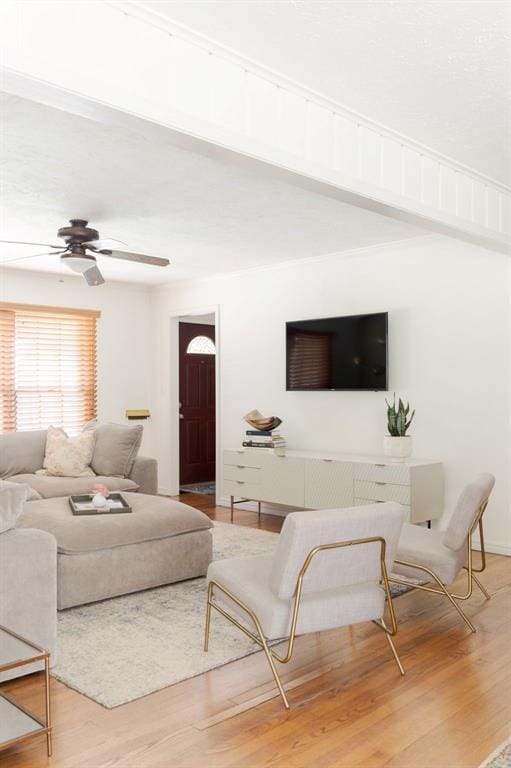 2800 Kerry Ln, Oklahoma City, OK 73120 - living area featuring wood finished floors, a ceiling fan, and beam ceiling