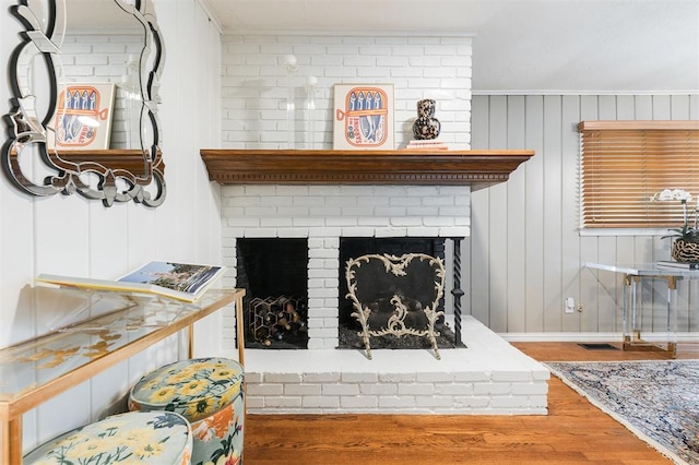 2800 Kerry Ln, Oklahoma City, OK 73120 - detailed view of wood finished floors and a brick fireplace