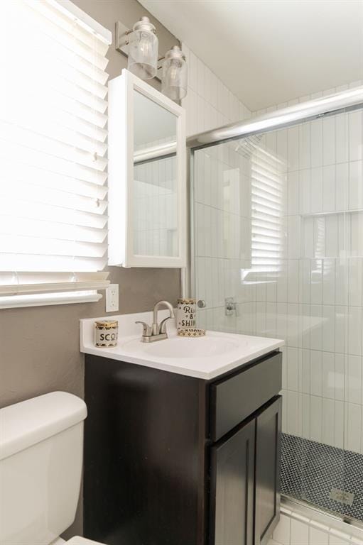 2800 Kerry Ln, Oklahoma City, OK 73120 - full bathroom with vanity, a stall shower, and healthy amount of natural light