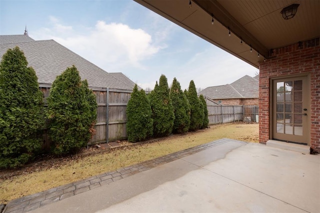 3101 White Cedar Dr, Moore, OK 73160 - fenced backyard with a patio area