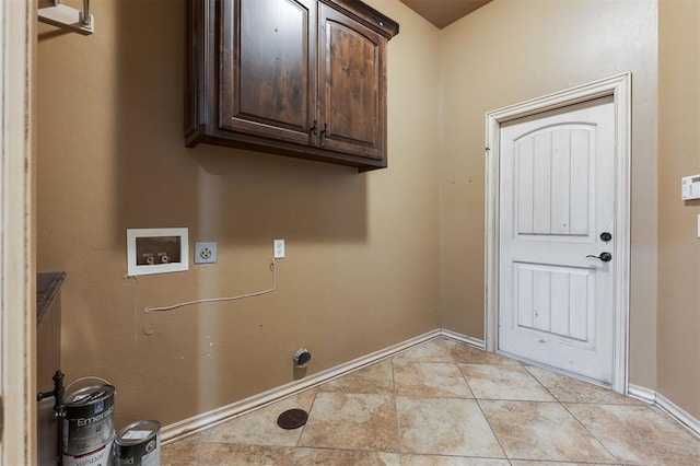 3101 White Cedar Dr, Moore, OK 73160 - washroom featuring cabinet space, hookup for an electric dryer, hookup for a washing machine, and light tile patterned floors