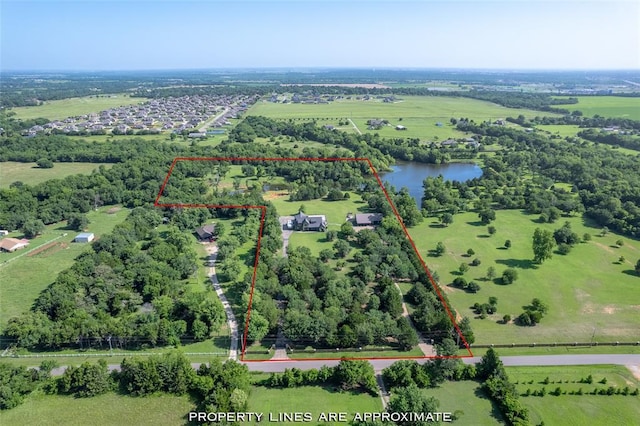 18569 310th St, Norman, OK 73072 - aerial view of sparsely populated area with property parcel outlined and a large body of water