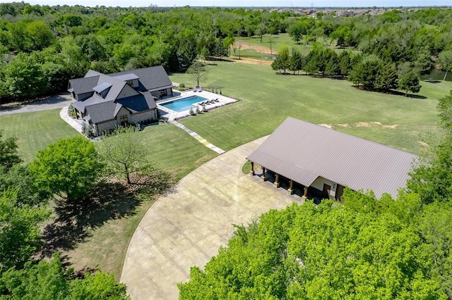 18569 310th St, Norman, OK 73072 - aerial view of property and surrounding area featuring a forest and a pool