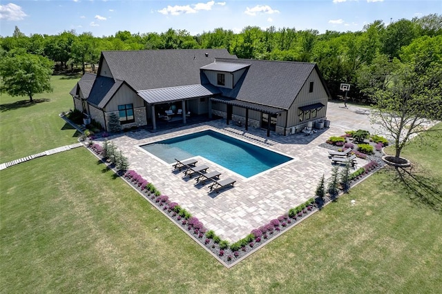 18569 310th St, Norman, OK 73072 - outdoor pool featuring a patio area and a lawn