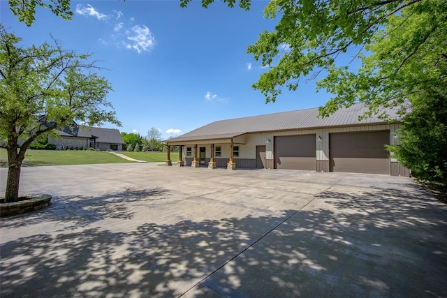 18569 310th St, Norman, OK 73072 - ranch-style house featuring driveway and a metal roof
