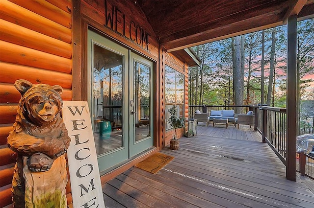 225 Stevens Rd, Broken Bow, OK 74728 - wooden deck featuring outdoor lounge area and french doors