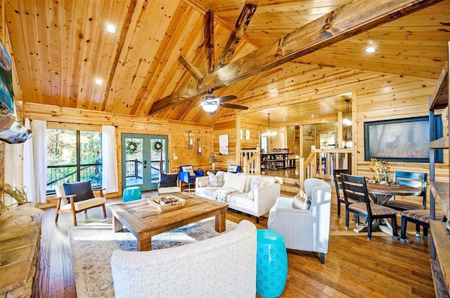 225 Stevens Rd, Broken Bow, OK 74728 - living area with wood walls, wood finished floors, french doors, a wood ceiling with exposed beams, and recessed lighting