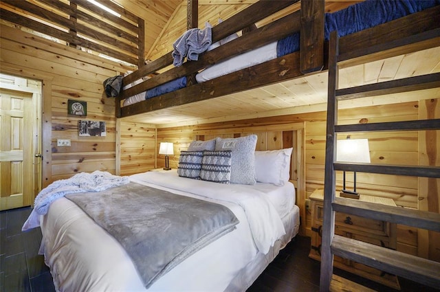 225 Stevens Rd, Broken Bow, OK 74728 - bedroom with wood walls, wooden ceiling, wood finished floors, and lofted ceiling