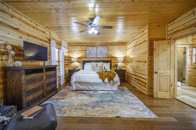 225 Stevens Rd, Broken Bow, OK 74728 - bedroom with wooden walls, wooden ceiling, and hardwood / wood-style floors