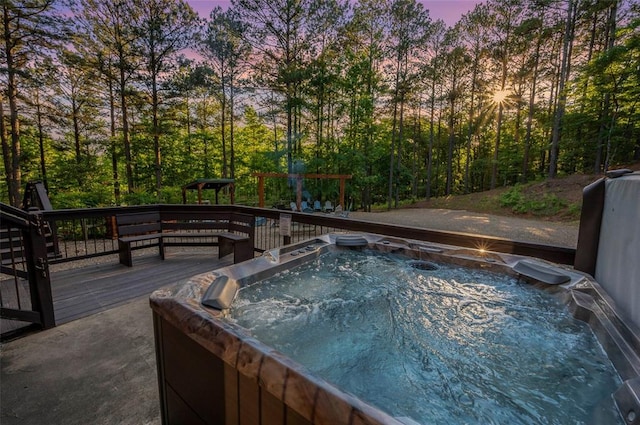 225 Stevens Rd, Broken Bow, OK 74728 - view of swimming pool with a hot tub and a deck