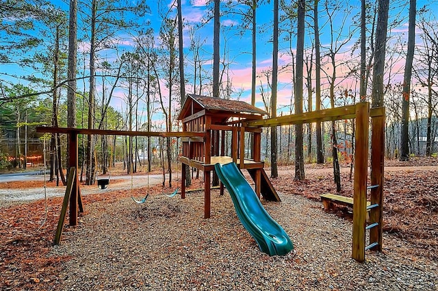225 Stevens Rd, Broken Bow, OK 74728 - view of playground at dusk