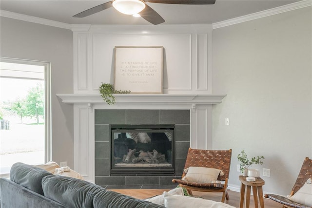 1848 County Road 1198, Tuttle, OK 73089 - detailed view of ceiling fan, a fireplace, ornamental molding, and wood finished floors