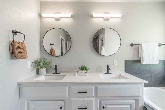 1848 County Road 1198, Tuttle, OK 73089 - bathroom featuring double vanity and a tub to relax in
