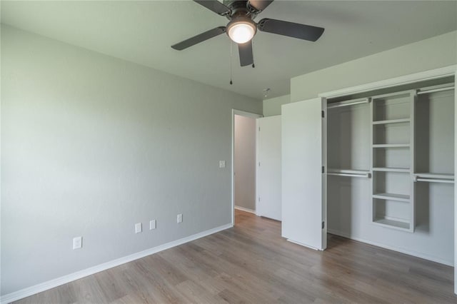 1848 County Road 1198, Tuttle, OK 73089 - unfurnished bedroom featuring wood finished floors, a closet, and ceiling fan