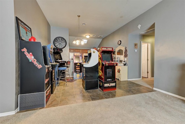 2233 NW 196th St, Edmond, OK 73012 - kitchen featuring a chandelier, light colored carpet, and hanging light fixtures