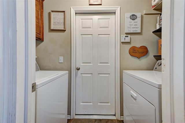 2233 NW 196th St, Edmond, OK 73012 - laundry area with washer and clothes dryer and cabinet space