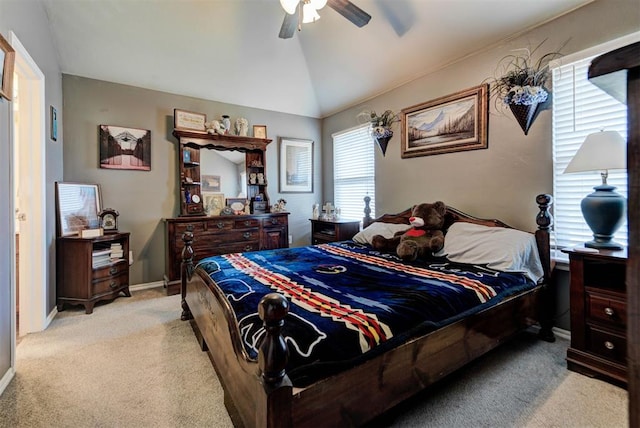 2233 NW 196th St, Edmond, OK 73012 - bedroom with light colored carpet, vaulted ceiling, and ceiling fan