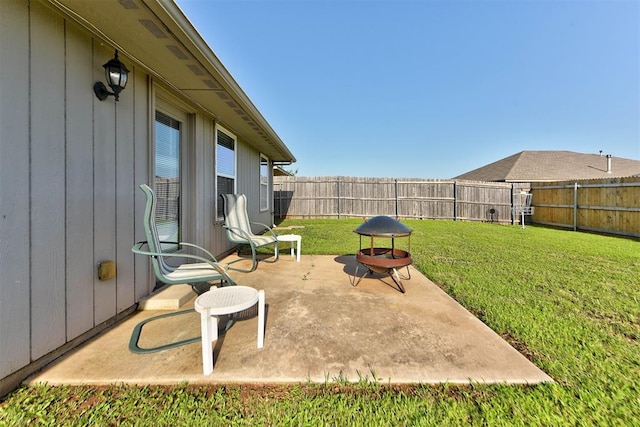 2233 NW 196th St, Edmond, OK 73012 - fenced backyard with a patio area