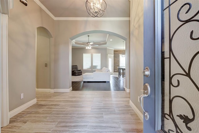 4600 Kentucky Ridge Dr, Mustang, OK 73064 - entrance foyer featuring arched walkways, ornamental molding, and ceiling fan