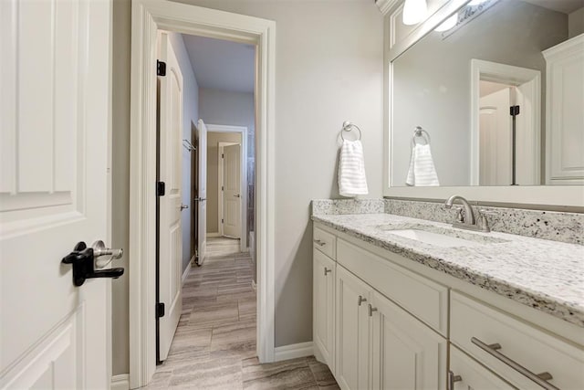 4600 Kentucky Ridge Dr, Mustang, OK 73064 - bathroom featuring vanity and baseboards