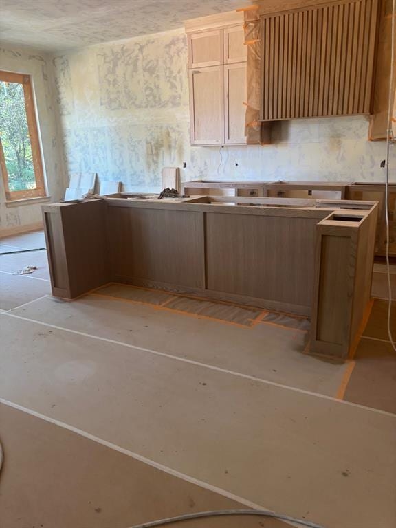 8209 Buffalo Rdg, Arcadia, OK 73007 - kitchen with wallpapered walls and ventilation hood