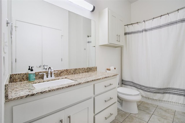 1 NE 2nd St Unit 402, Oklahoma City, OK 73104 - bathroom with vanity, tile patterned floors, and curtained shower