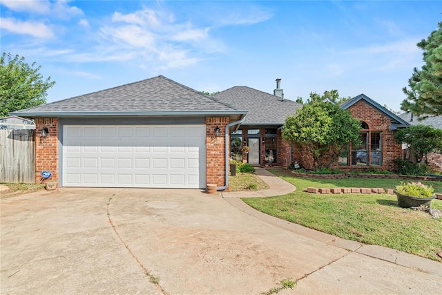 4924 Byron Cir, Yukon, OK 73099 - view of front of house with brick siding, concrete driveway, a garage, and roof with shingles