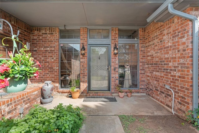4924 Byron Cir, Yukon, OK 73099 - doorway to property featuring brick siding